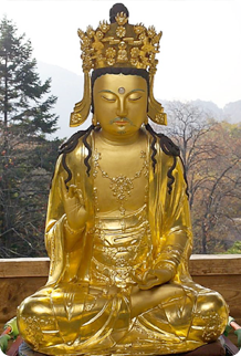Wooden statue of the seated Avalokitesvara